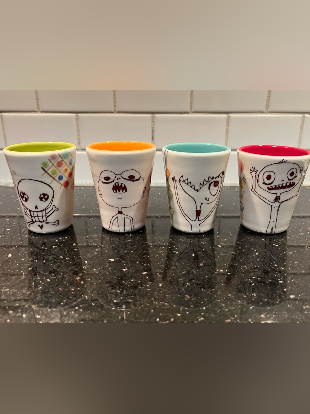 Lollipop Pottery Set of Four Shot Glasses Monster and Lolliskull Multicolor